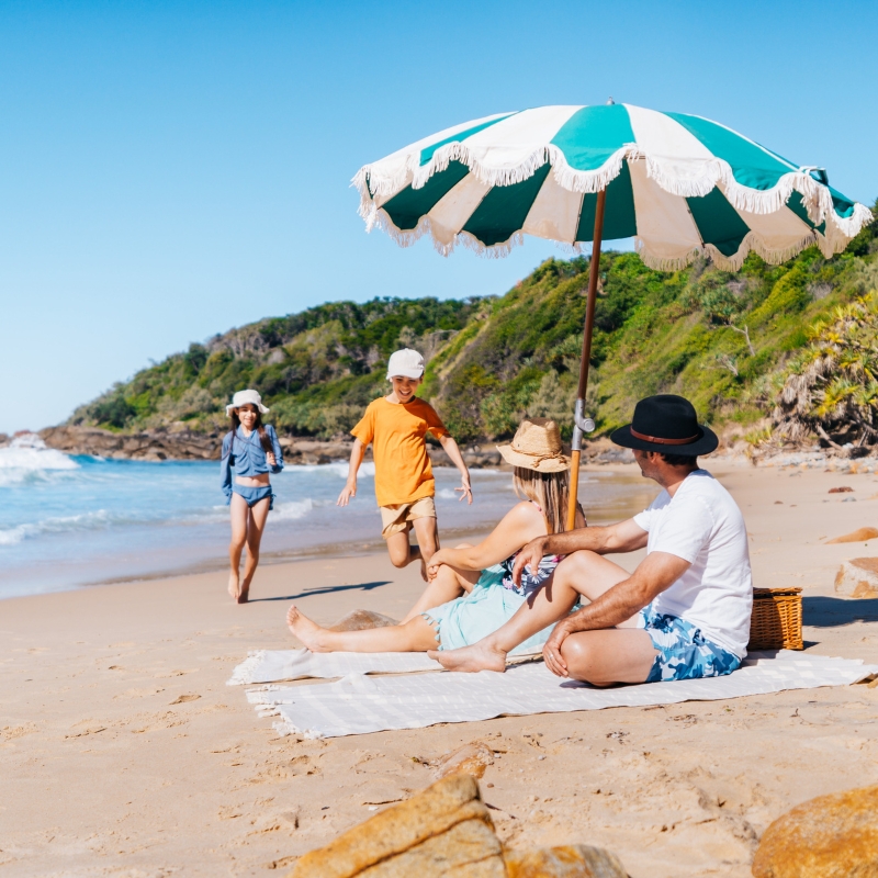 family on the beach in noosa